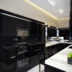 Amazing Contemporary Kitchen Design With Elegant Black Cabinets And Bar And Looks Matching Combined With White Countertops And Black Bar Stools